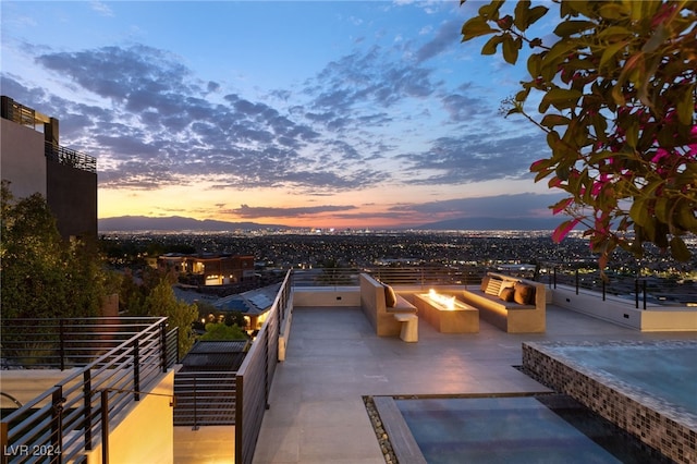 view of community featuring a patio and an outdoor hangout area