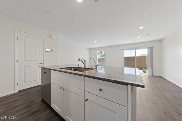 kitchen featuring sink, dark hardwood / wood-style flooring, stainless steel dishwasher, an island with sink, and white cabinets