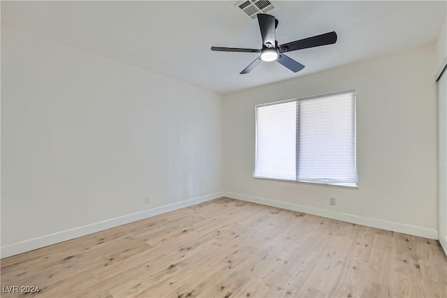 unfurnished room with ceiling fan and light hardwood / wood-style flooring