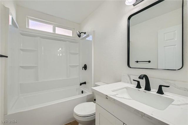 full bathroom with vanity,  shower combination, toilet, and vaulted ceiling