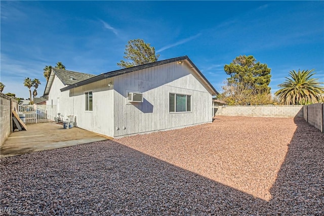 back of house featuring a patio