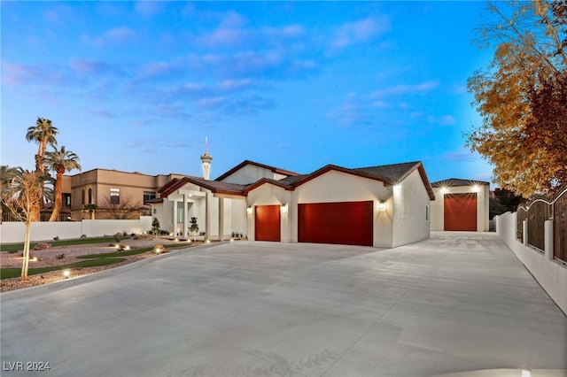 view of front of property with a garage