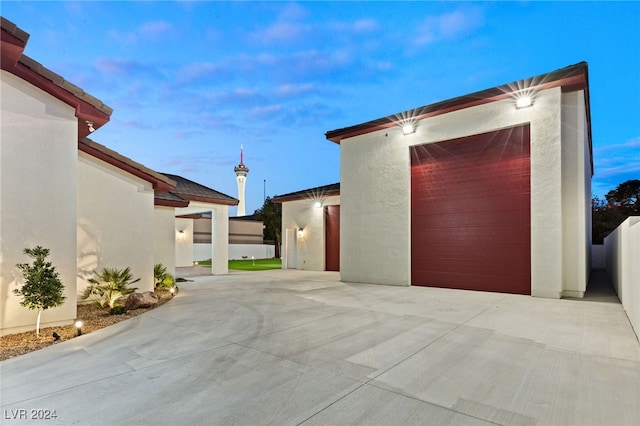 view of property exterior at dusk