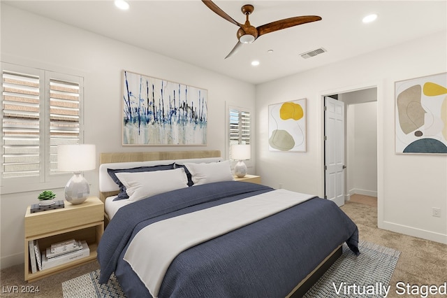 carpeted bedroom featuring ceiling fan