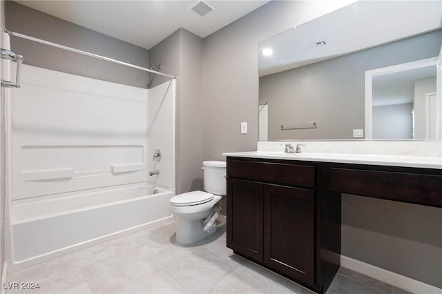 full bathroom with bathtub / shower combination, tile patterned floors, vanity, and toilet