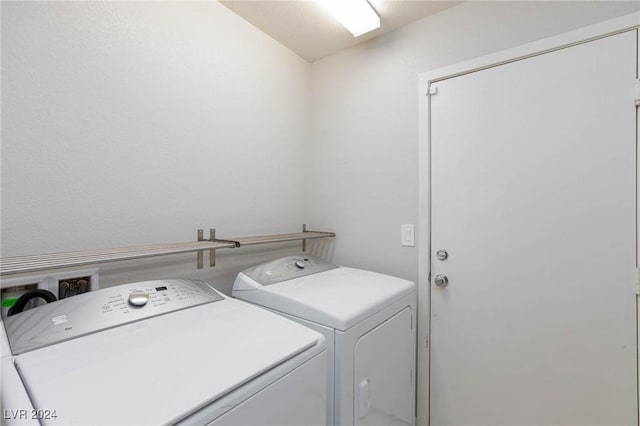 laundry room featuring independent washer and dryer