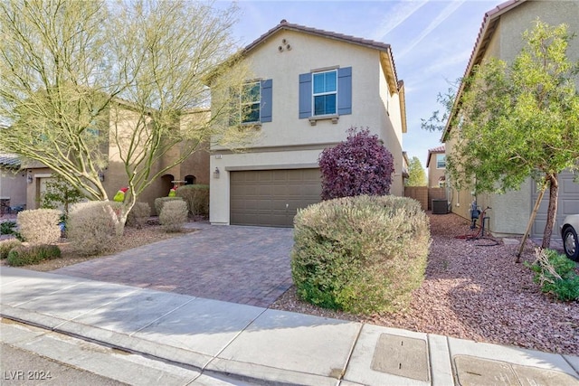 view of front of property with a garage