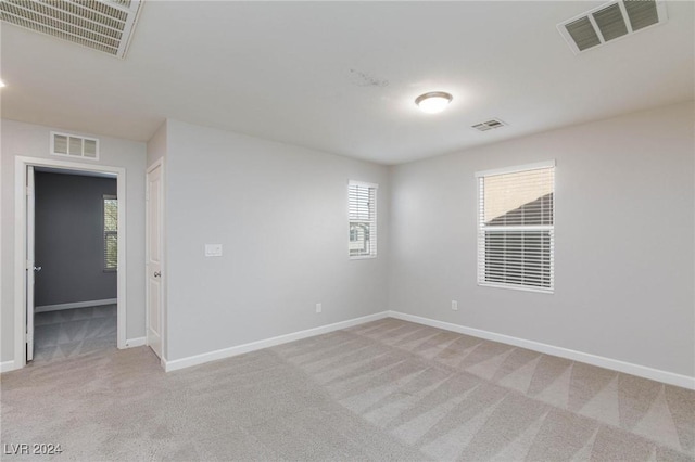 view of carpeted spare room