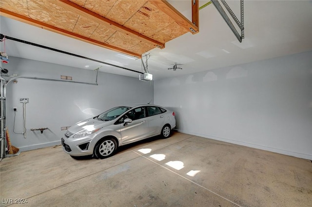 garage featuring a garage door opener