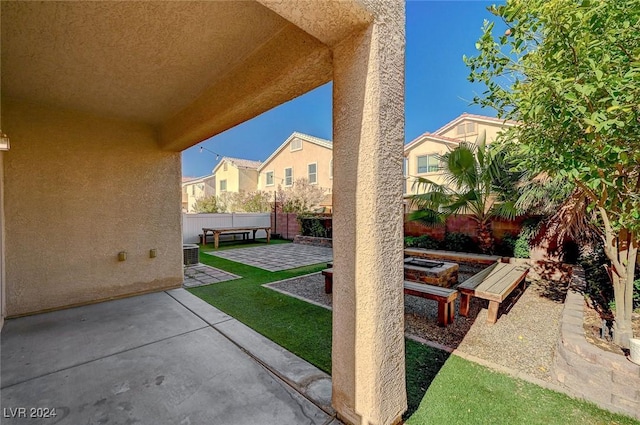 view of patio with central AC unit