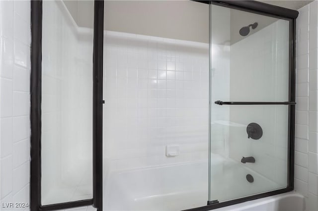 bathroom featuring enclosed tub / shower combo