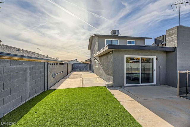 view of yard with a patio area and cooling unit