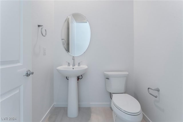 bathroom featuring toilet