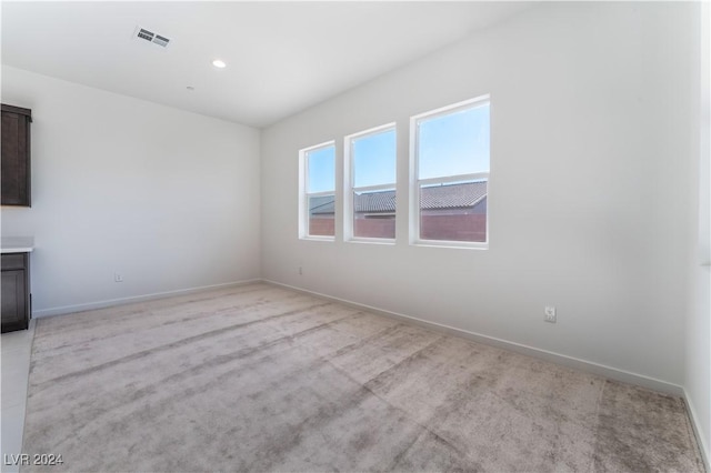 view of carpeted spare room