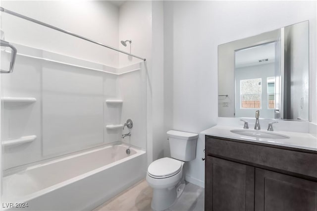 full bathroom with vanity, shower / bath combination, and toilet