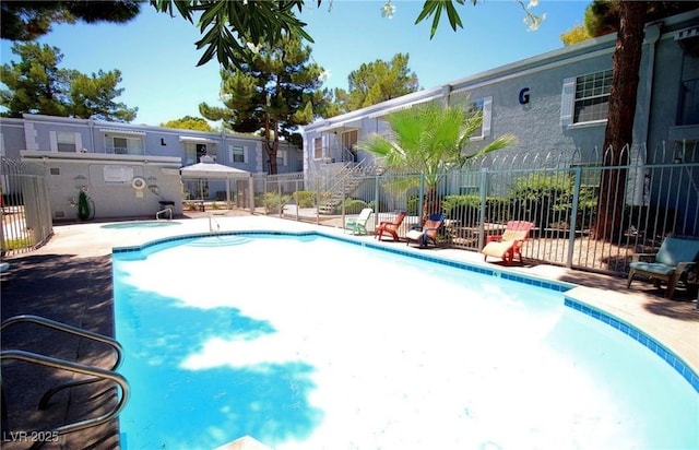 view of pool featuring a patio area