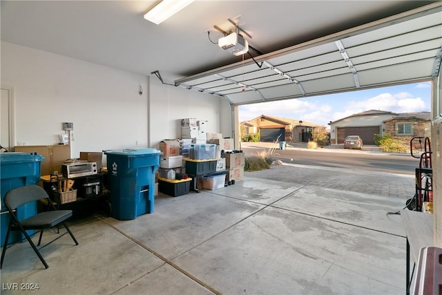 garage featuring a garage door opener