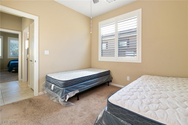 bedroom with carpet and ceiling fan