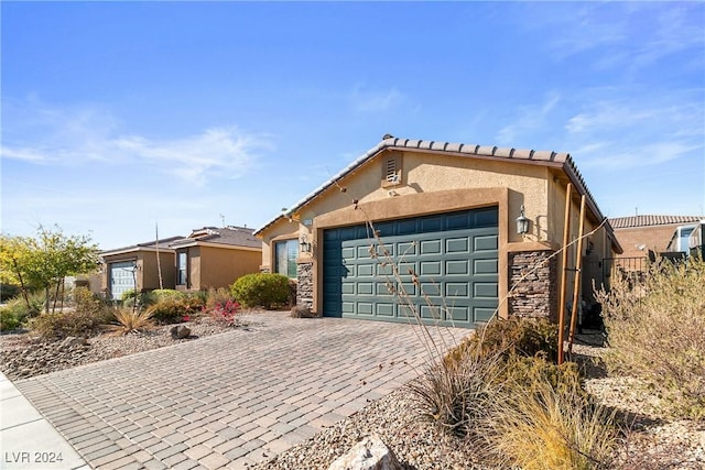 view of front of home featuring a garage