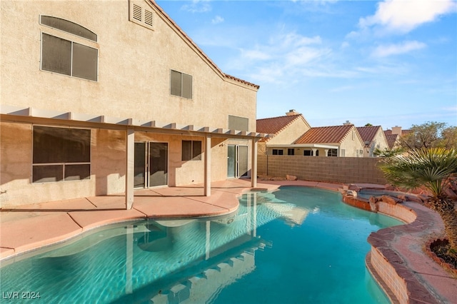 view of pool featuring a patio