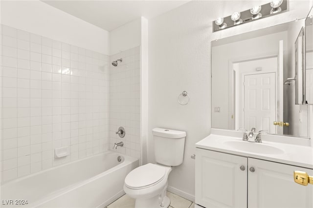 full bathroom featuring toilet, vanity, tile patterned floors, and tiled shower / bath combo