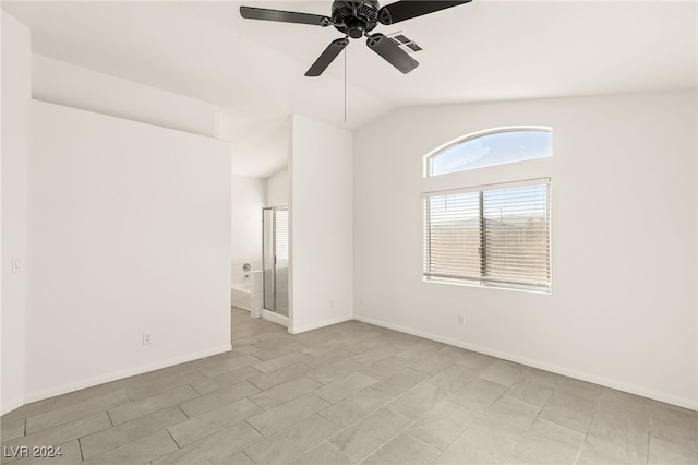 unfurnished room featuring ceiling fan and vaulted ceiling