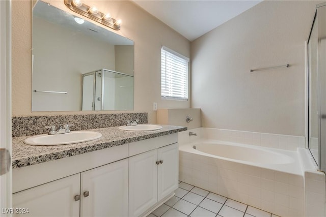 bathroom featuring vanity, separate shower and tub, and tile patterned floors