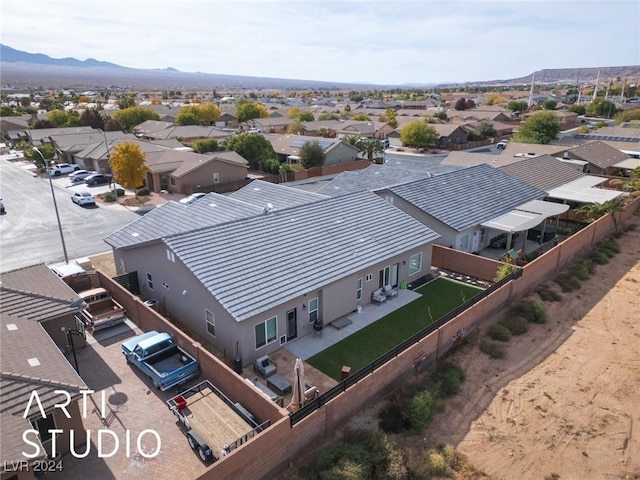 drone / aerial view featuring a mountain view