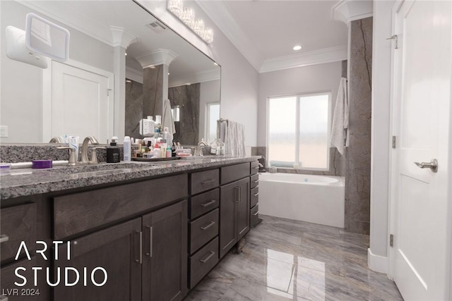 bathroom with vanity, a bath, and ornamental molding