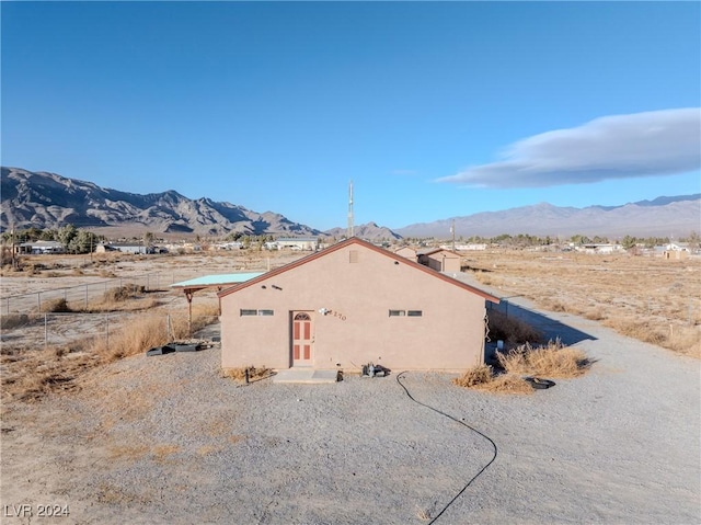 exterior space featuring a mountain view