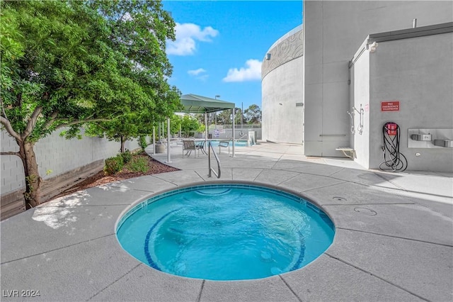 view of swimming pool featuring a patio