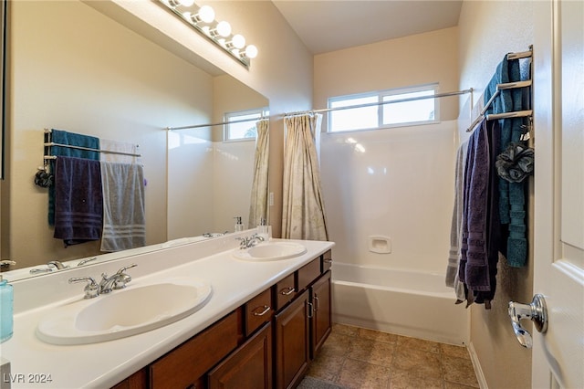 bathroom featuring vanity and shower / bath combo with shower curtain