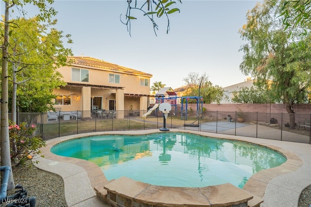 view of swimming pool featuring a patio area