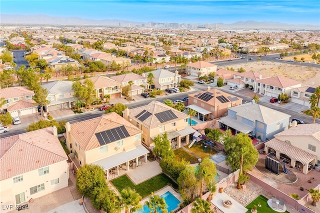 birds eye view of property featuring a mountain view