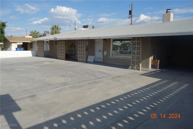 4709 W Alpine Pl, Las Vegas, NV 89107 - ranch-style home featuring stucco siding and a chimney