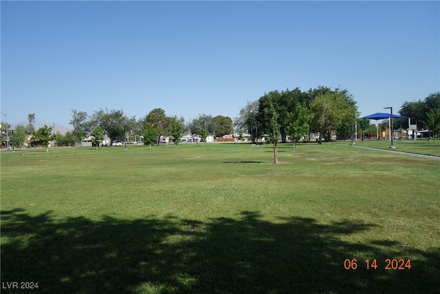 surrounding community with a yard