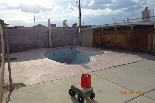 view of pool featuring a patio area