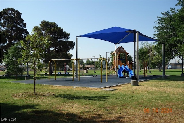 view of playground featuring a lawn