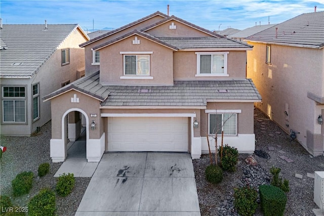 view of property featuring a garage