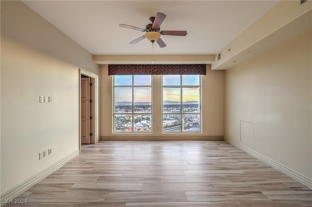 empty room with ceiling fan