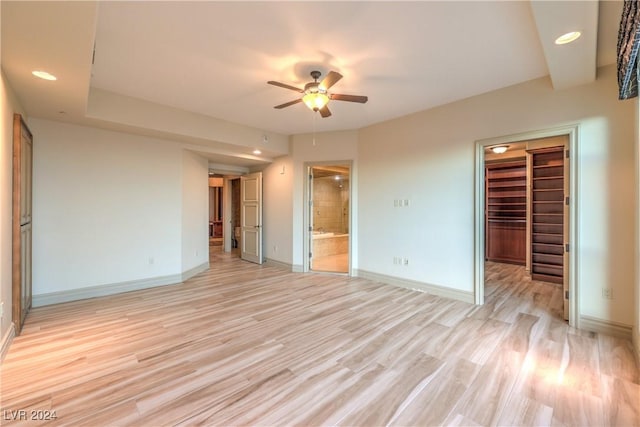 unfurnished room featuring ceiling fan and light hardwood / wood-style floors