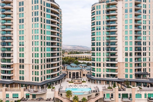 view of building exterior with a mountain view