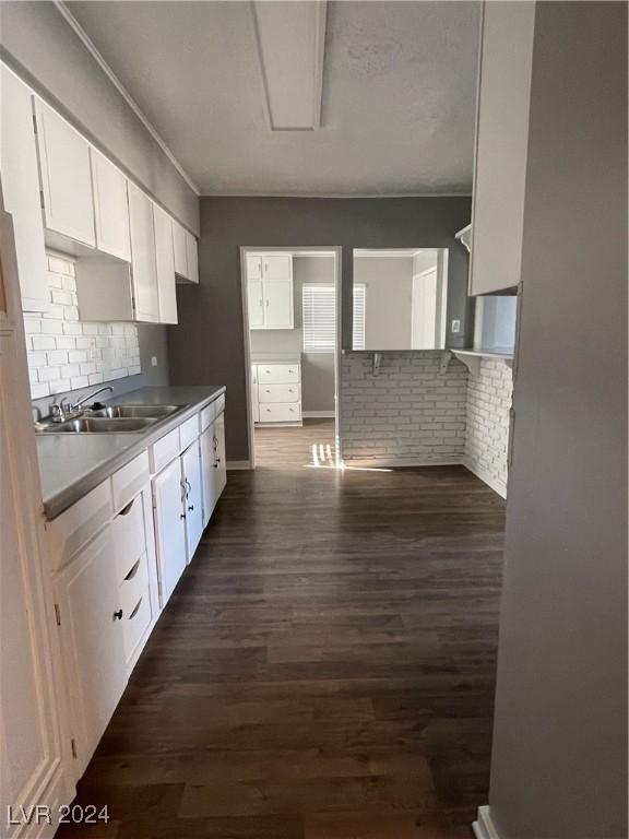 14 California Way, Henderson, NV 89015 - kitchen with dark hardwood / wood-style flooring, white cabinetry, and sink
