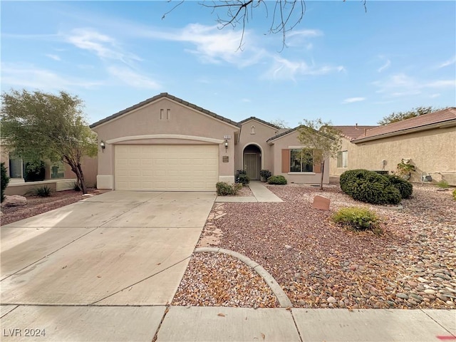 single story home with a garage