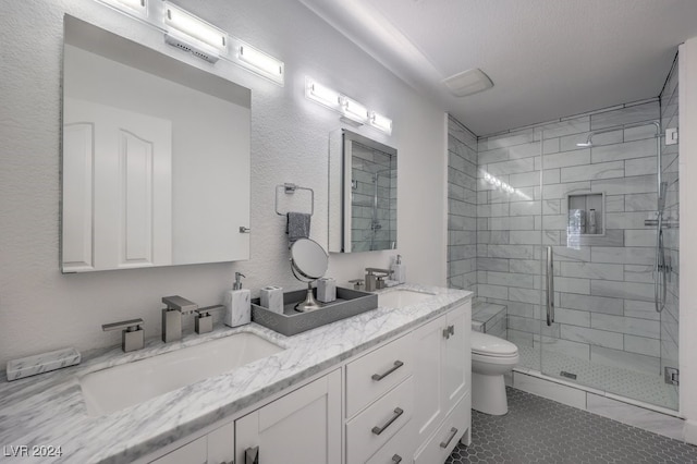 bathroom featuring tile patterned floors, a shower with shower door, a textured ceiling, and toilet