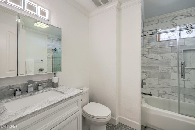 full bathroom featuring combined bath / shower with glass door, vanity, toilet, and crown molding