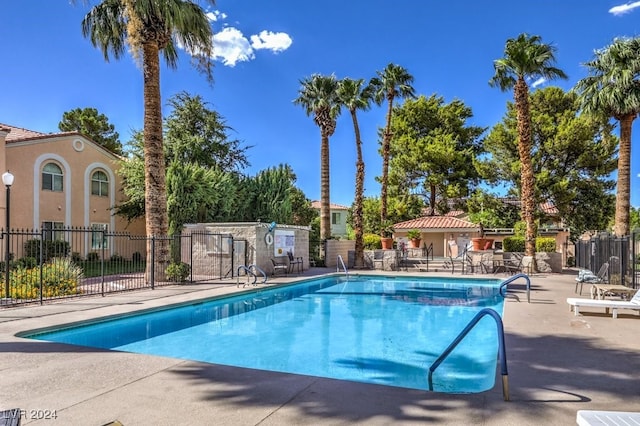 view of swimming pool featuring a patio