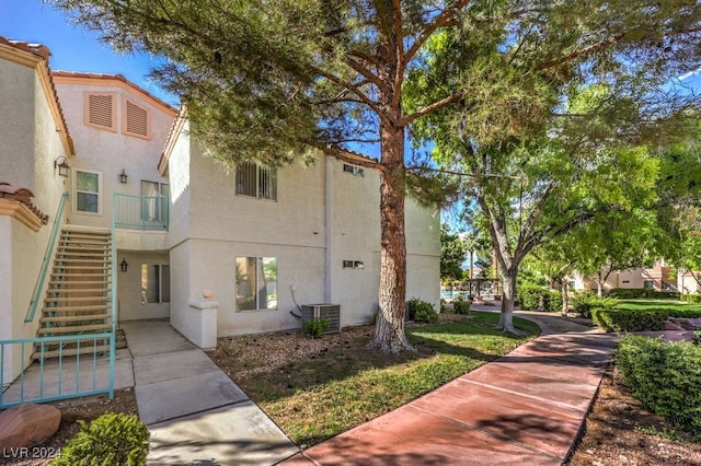 view of front of home featuring central AC unit