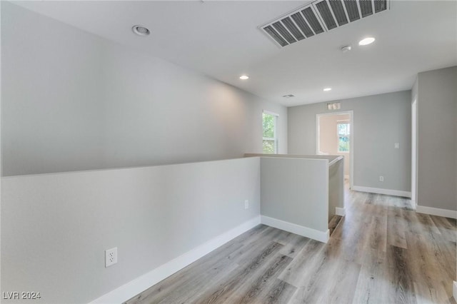 hallway featuring light hardwood / wood-style flooring