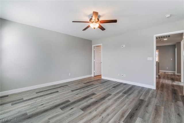 unfurnished room featuring wood-type flooring and ceiling fan